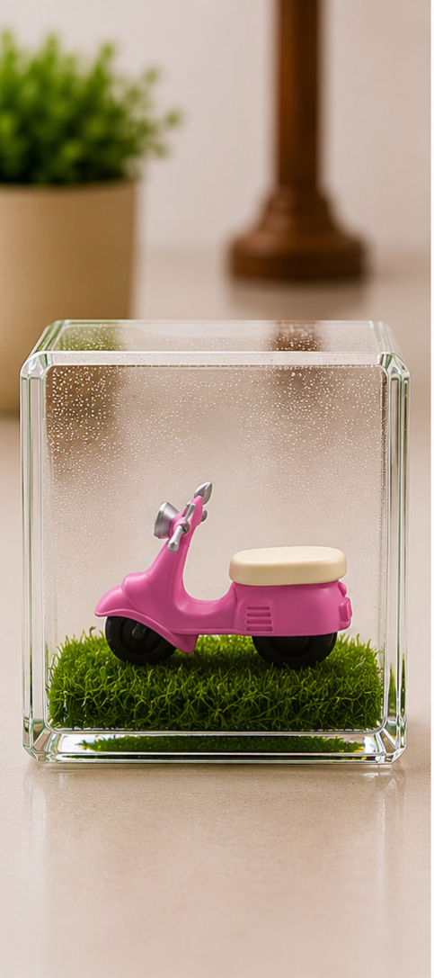 Pink miniature scooter