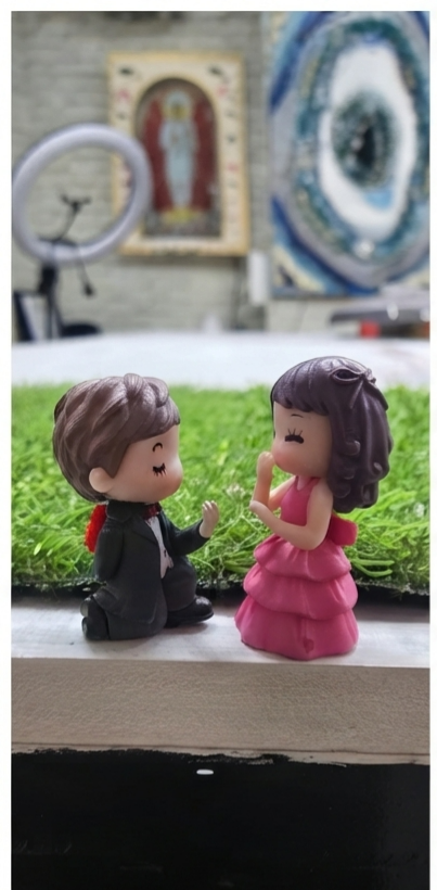 COUPLE PROPOSING MINIATURE